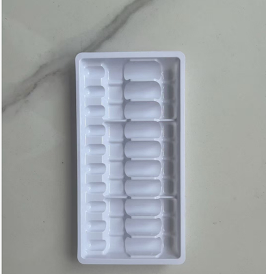 2 ml de 10 cápsulas internas de plástico