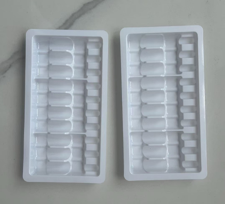 Producción personalizada de bandejas de plástico (bandejas PET) para viales de 2 mililitros y 10 dosis, bandejas para ampollas.  Bienvenido a consultar.